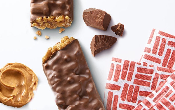 Special K Protein Bars with chocolate pieces and peanut butter on a white background