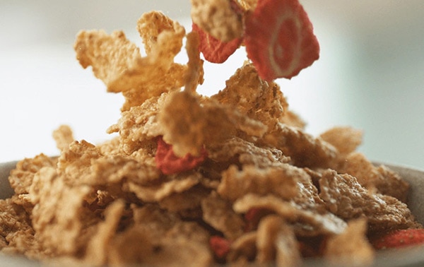 Special K Strawberry Cereal falling into a bowl
